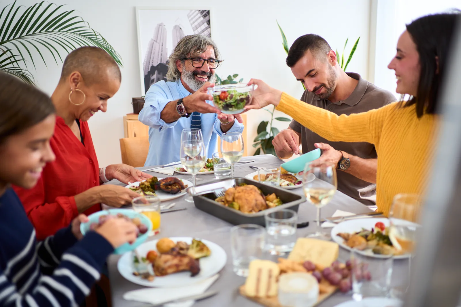 A family sharing a meal together at home, no phones or screens on the table