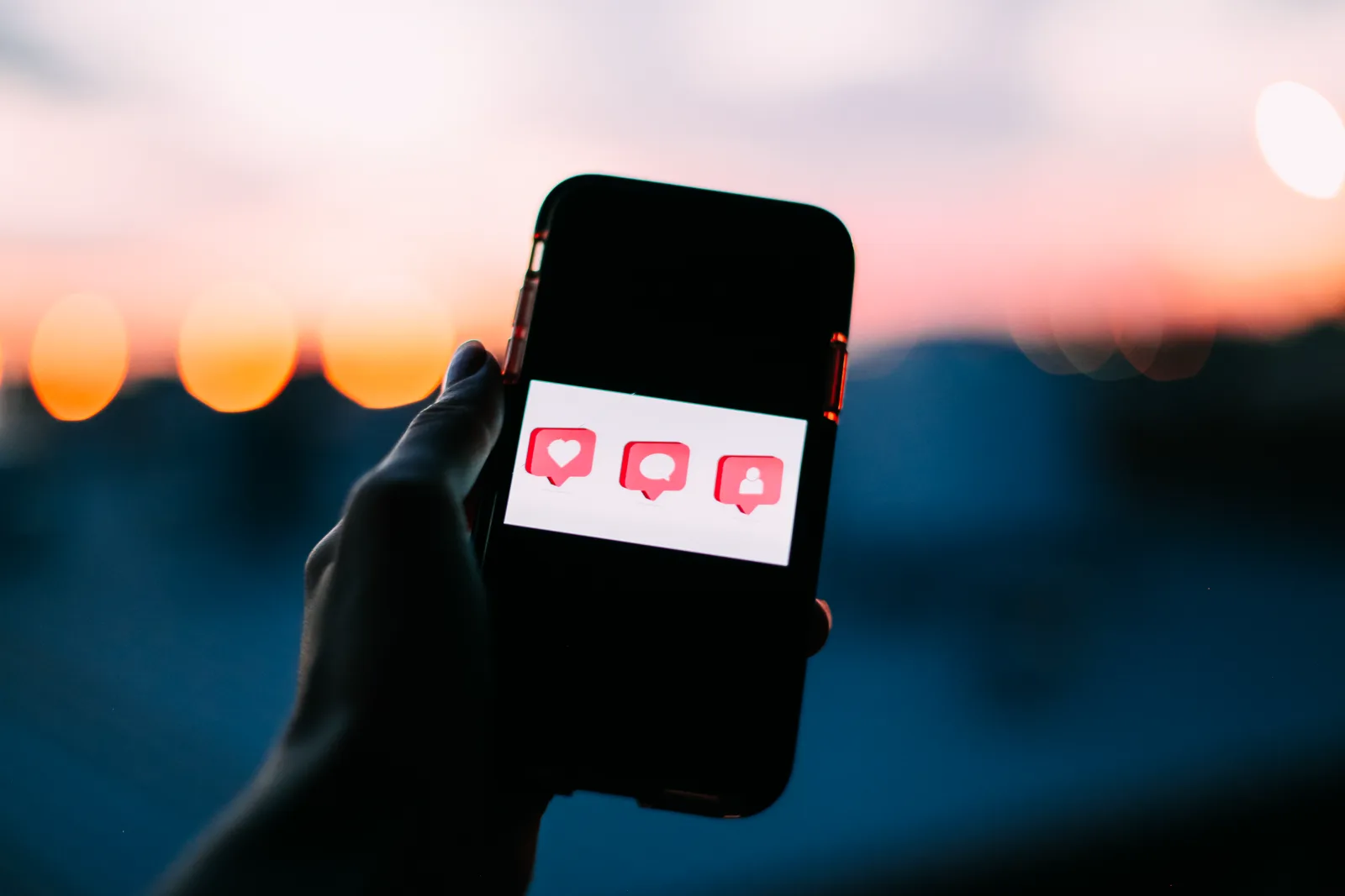 A smartphone showing a stream of social media notifications